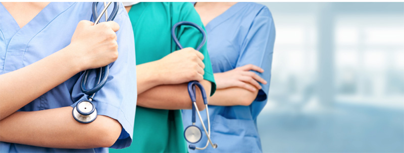 Three lady nurses standing